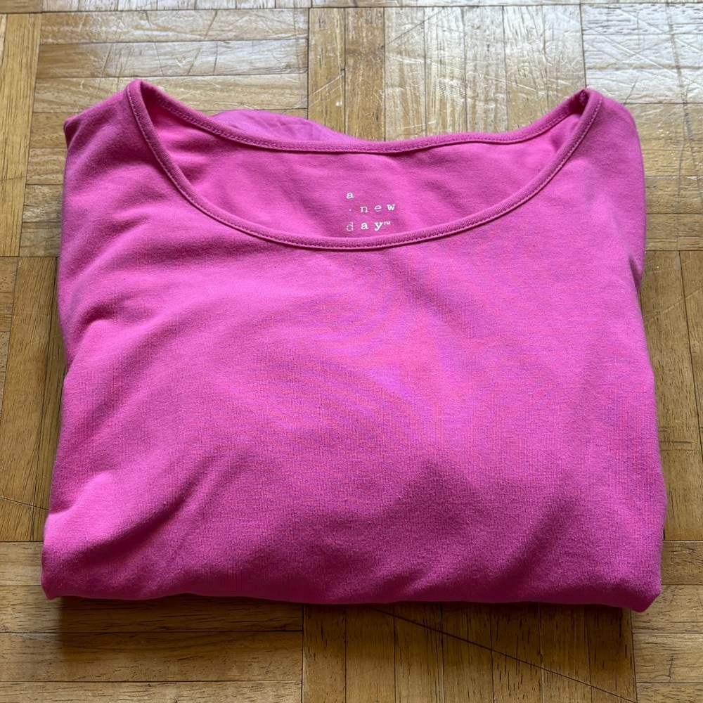 A New Day pink puff sleeve shirt in a size L